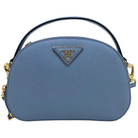 prada bucket bag saffiano leather gold tone blue|prada odette saffiano.